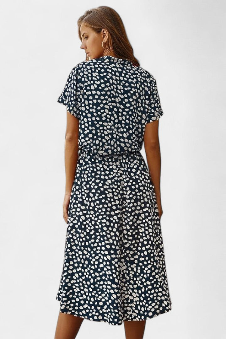 Rovena Vestido Midi de Lunares con Cuello Camisero y Cintura Ajustable