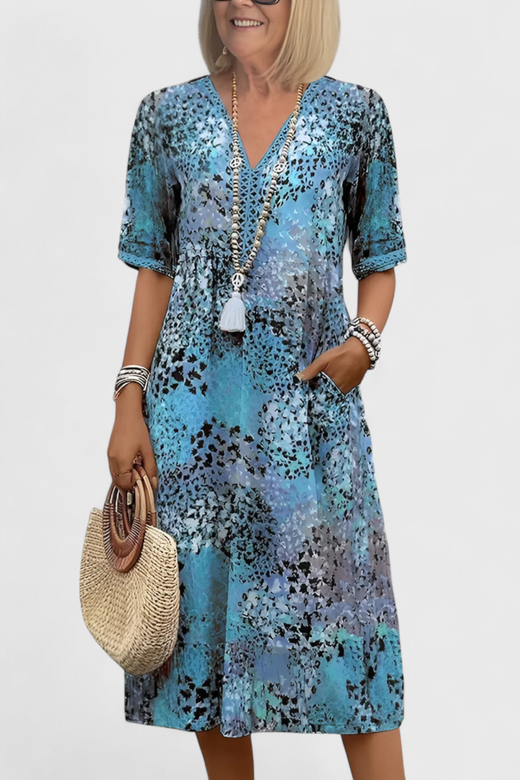 Perla Vestido Boho con Estampado Floral y Detalles en Crochet