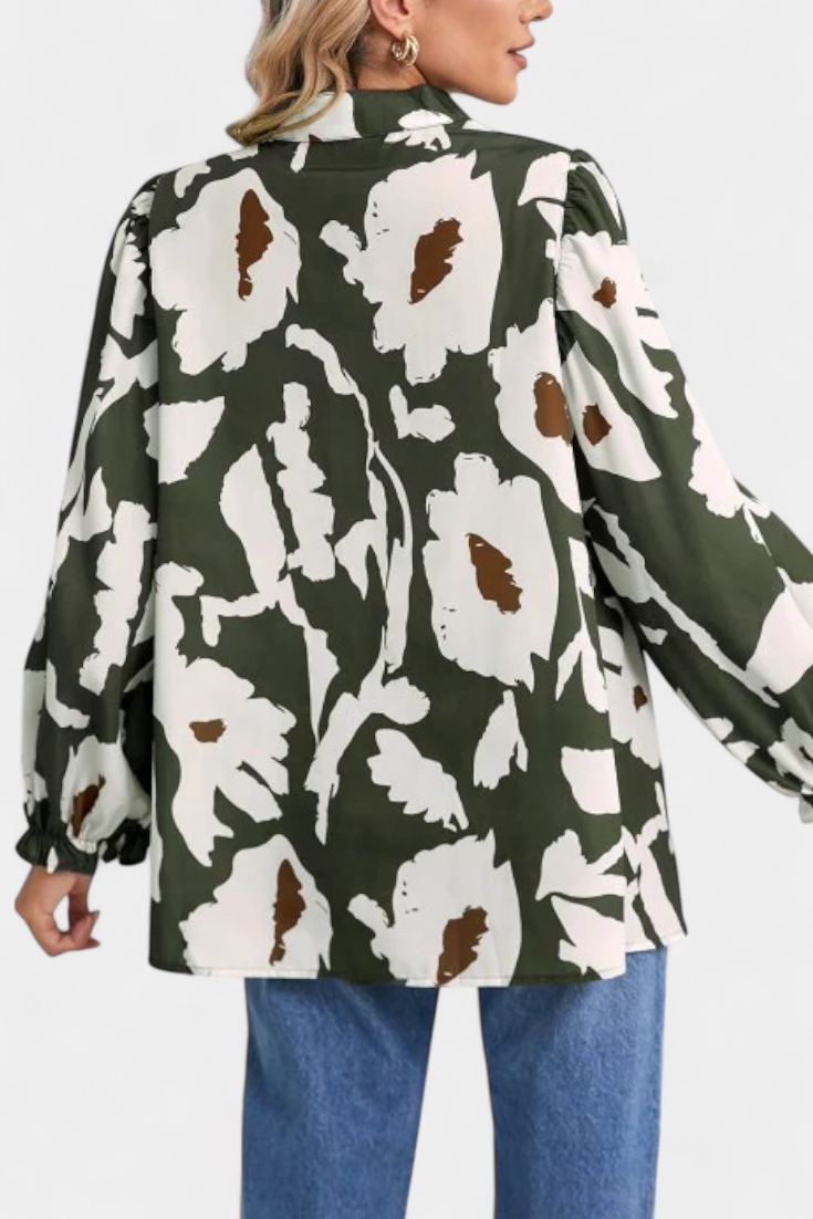 Filomena Blusa con Media Botonadura y Manga Abullonada en Estampado Floral Abstracto