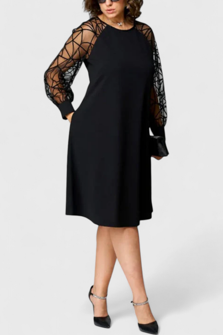 Bellezza Vestido Negro con Mangas de Malla y Corte Holgado